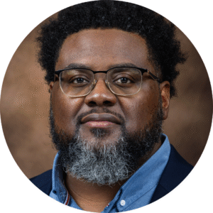 A photo of an African American man with graying beard.